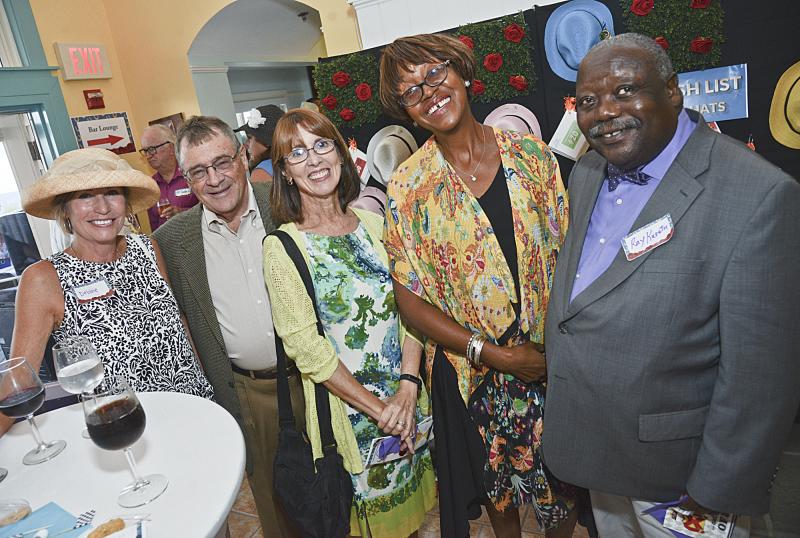 Enjoying the event are Debbie Sheing, Dr. Roger and Kathy Coletti, and Mildred and Dr. Ray Kuretu.